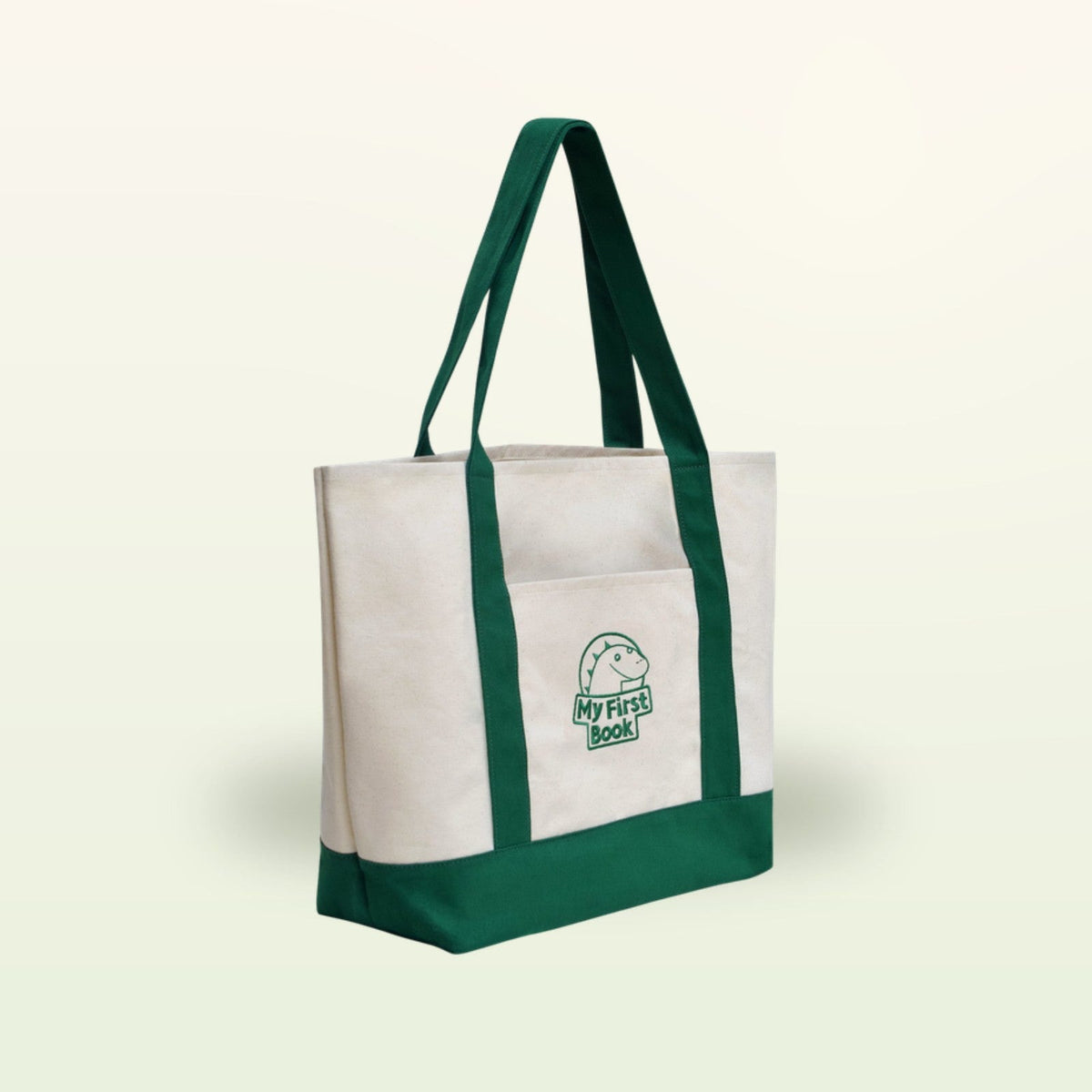 My First Book Tragetasche – cremefarbene Stofftasche mit grünen Henkeln