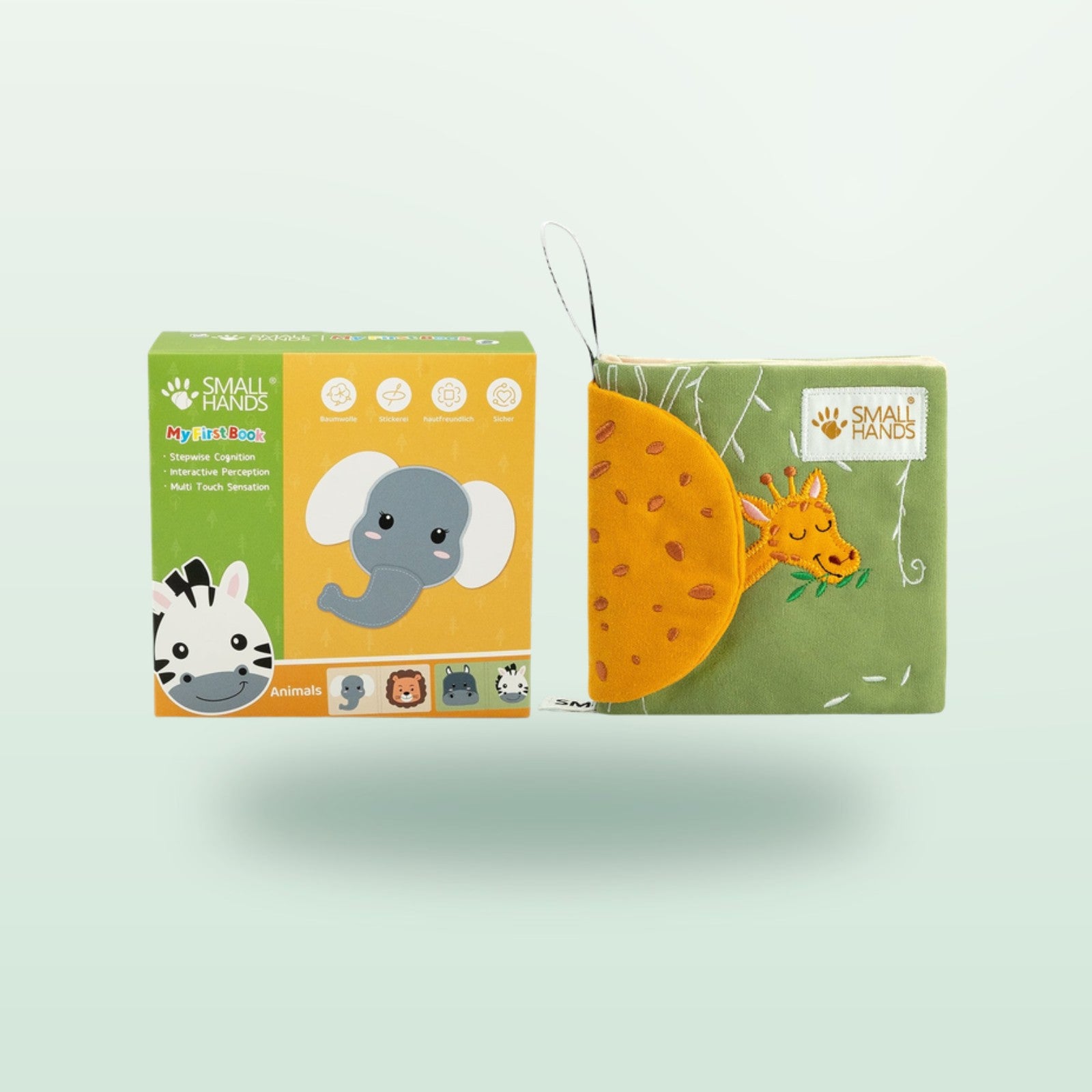 Small Hands Tiere Afrikas Montessori Stoffbuch mit Verpackung auf sanftem Waldgrün-Hintergrund – ab 0 Monaten