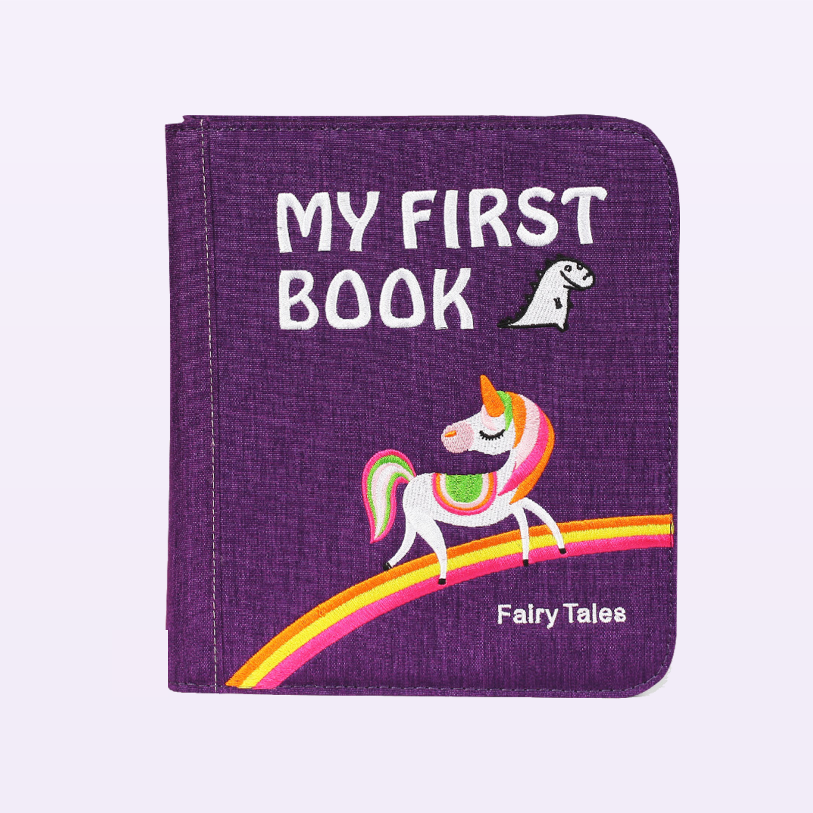 Märchenwelten Quiet Book geschlossen – lila MY-FIRST-BOOK-Fairy-Tales-Cover mit Einhorn und Regenbogen auf sanftem Lavendel-Hintergrund